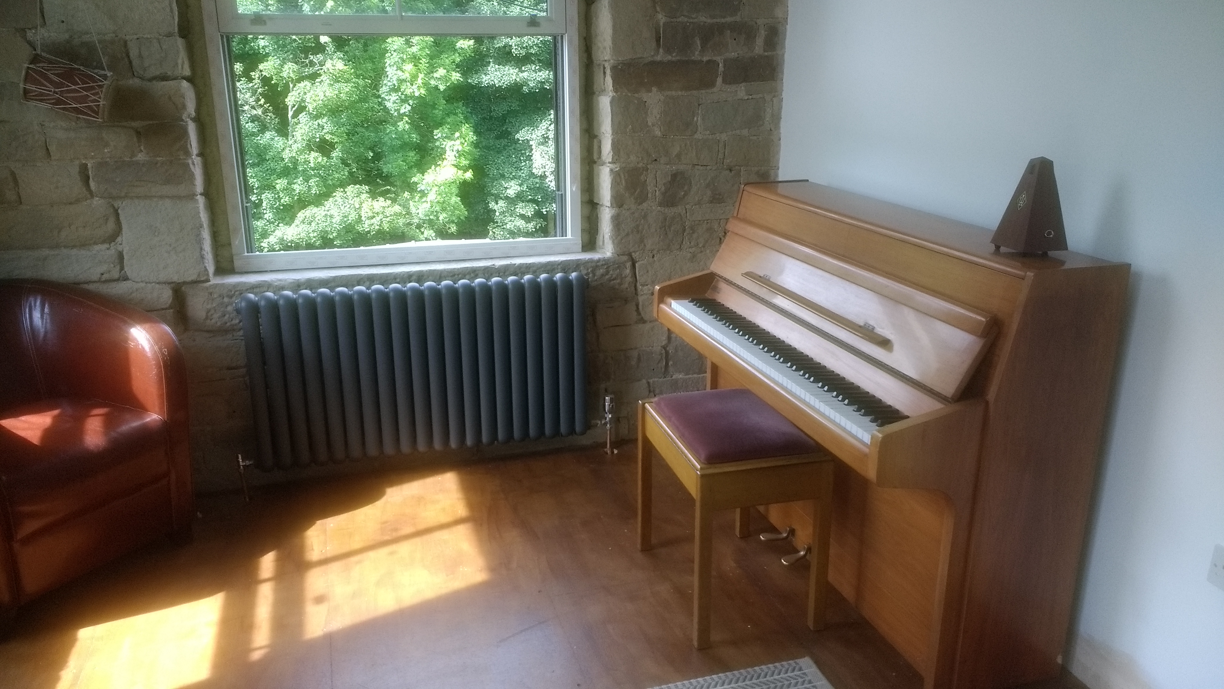 Piano teaching room in Luddenfoot, Halifax. 